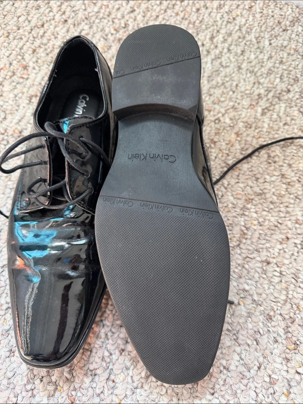 Calvin Klein sleek patent